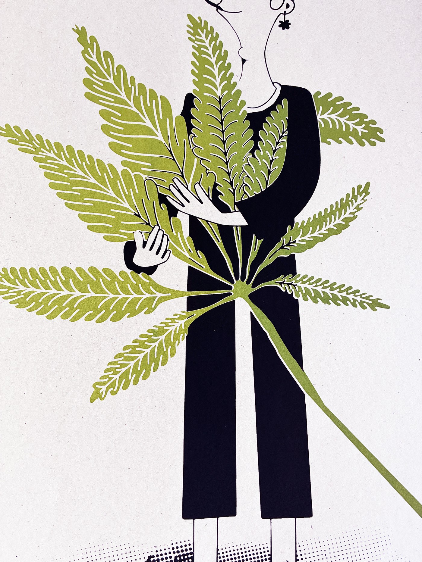 Close-up of the leaf and the cannabis man’s arms wrapped around it