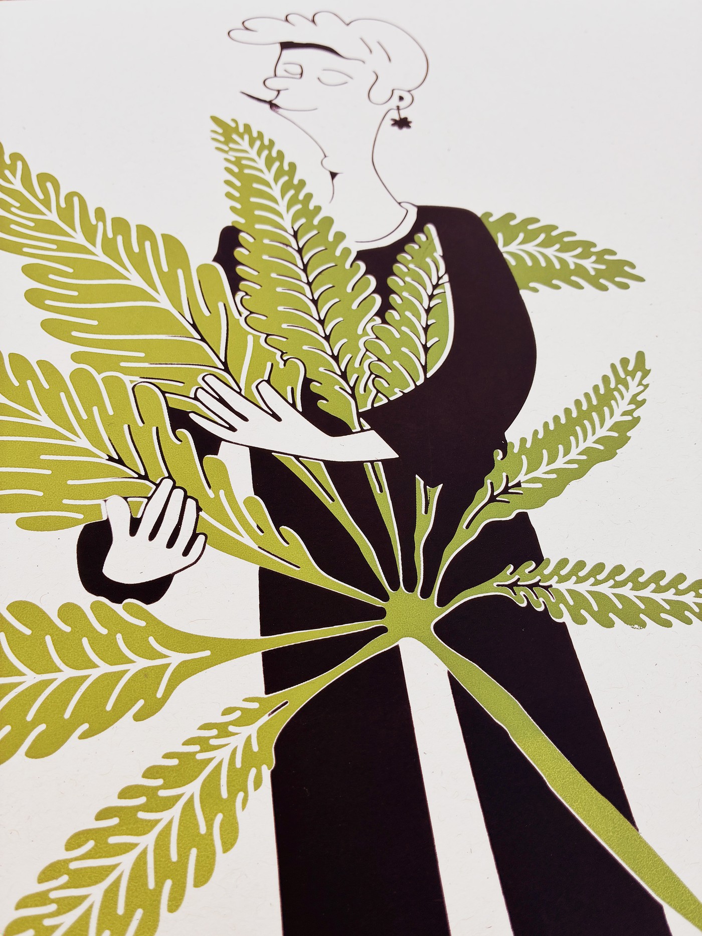 Close-up of the cannabis man hugging the serrated green leaf