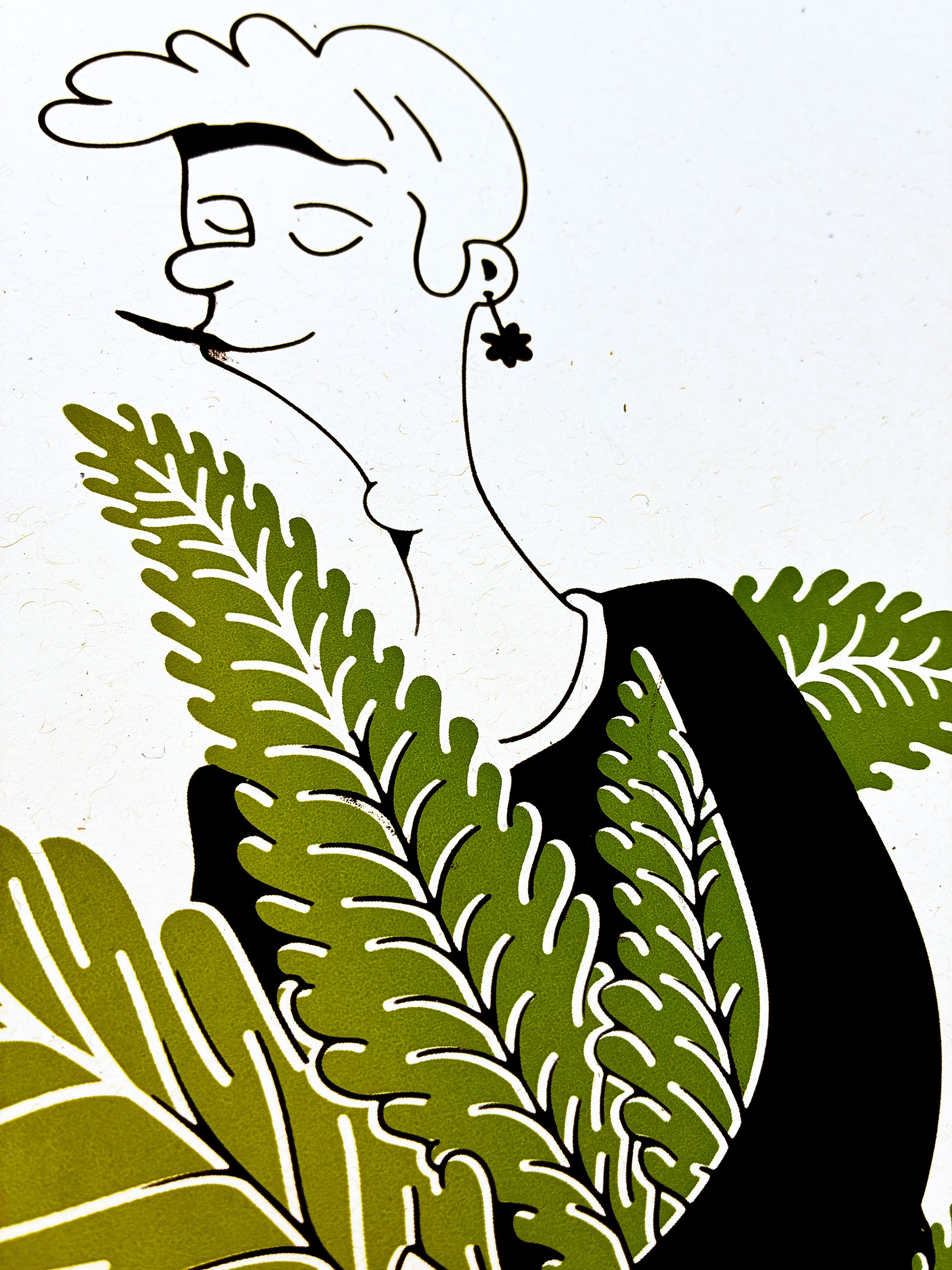 Close-up of the cannabis man’s face and the top of the giant leaf
